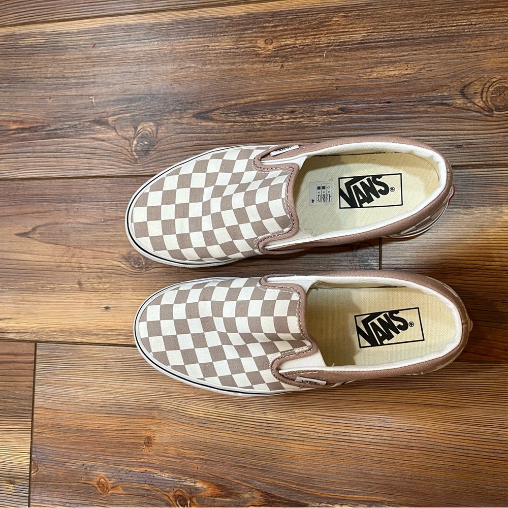 Women’s taupe and white slip on Vans